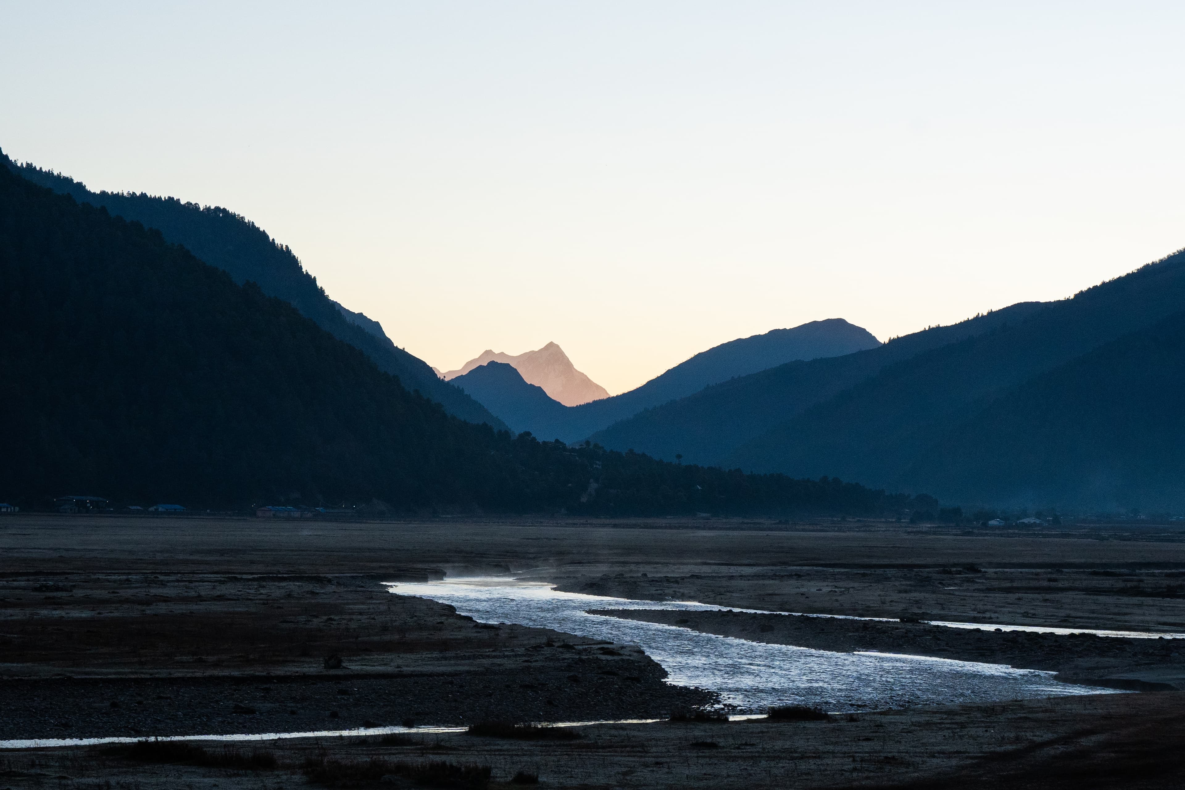 Dusk settles over the valley floor